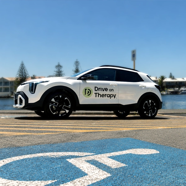 Drive On Therapy vehicle parked in an accessible parking bay along the Mandurah foreshore, supporting driving assessments and rehabilitation services across the Peel region.